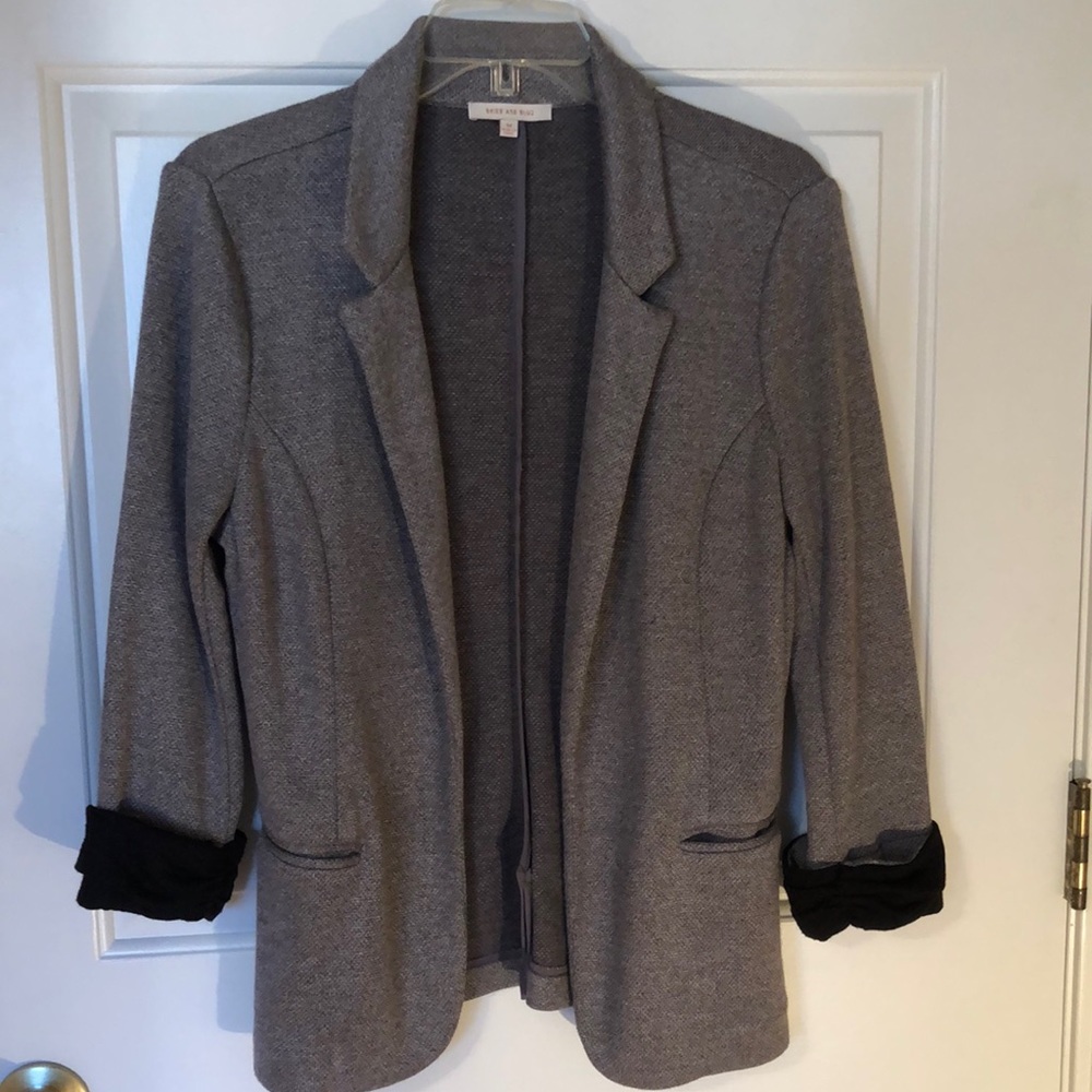 Gray one front button jacket.